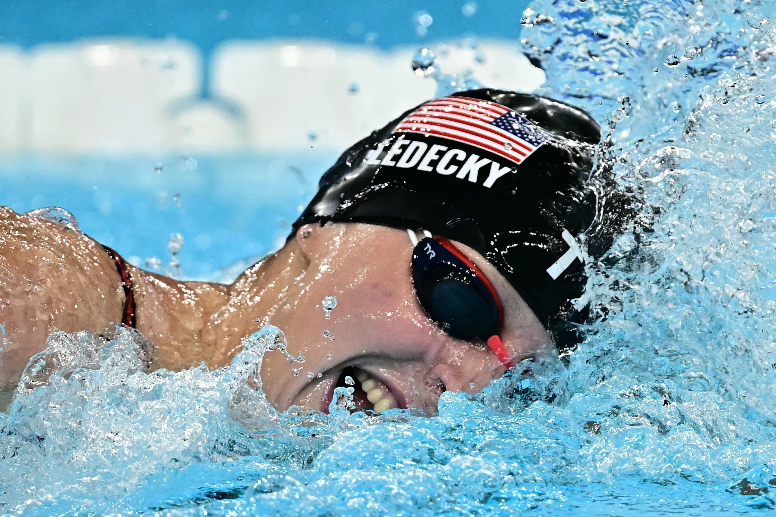 US' Katie lt;HIT gt;Ledecky lt;/HIT gt; competes in the final of the women's 800m freestyle swimming event during the Paris 2024 Olympic Games at the Paris La Defense Arena in Nanterre, west of Paris, on August 3, 2024. (Photo by Manan VATSYAYANA / AFP)