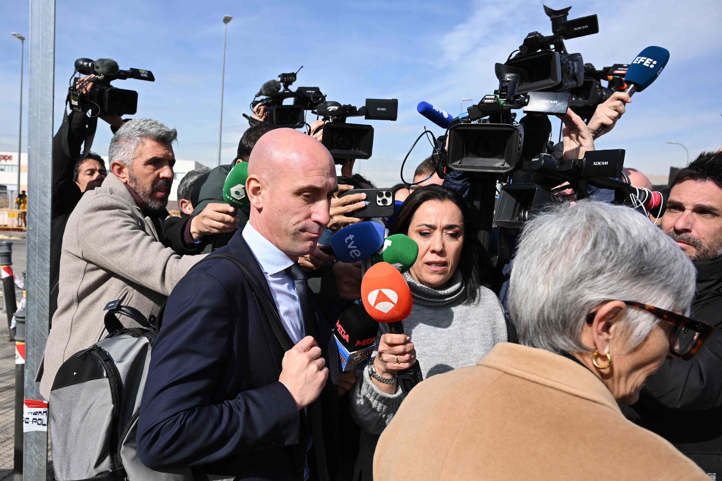 Rubiales y Olga Tubau, a la entrada al juicio.