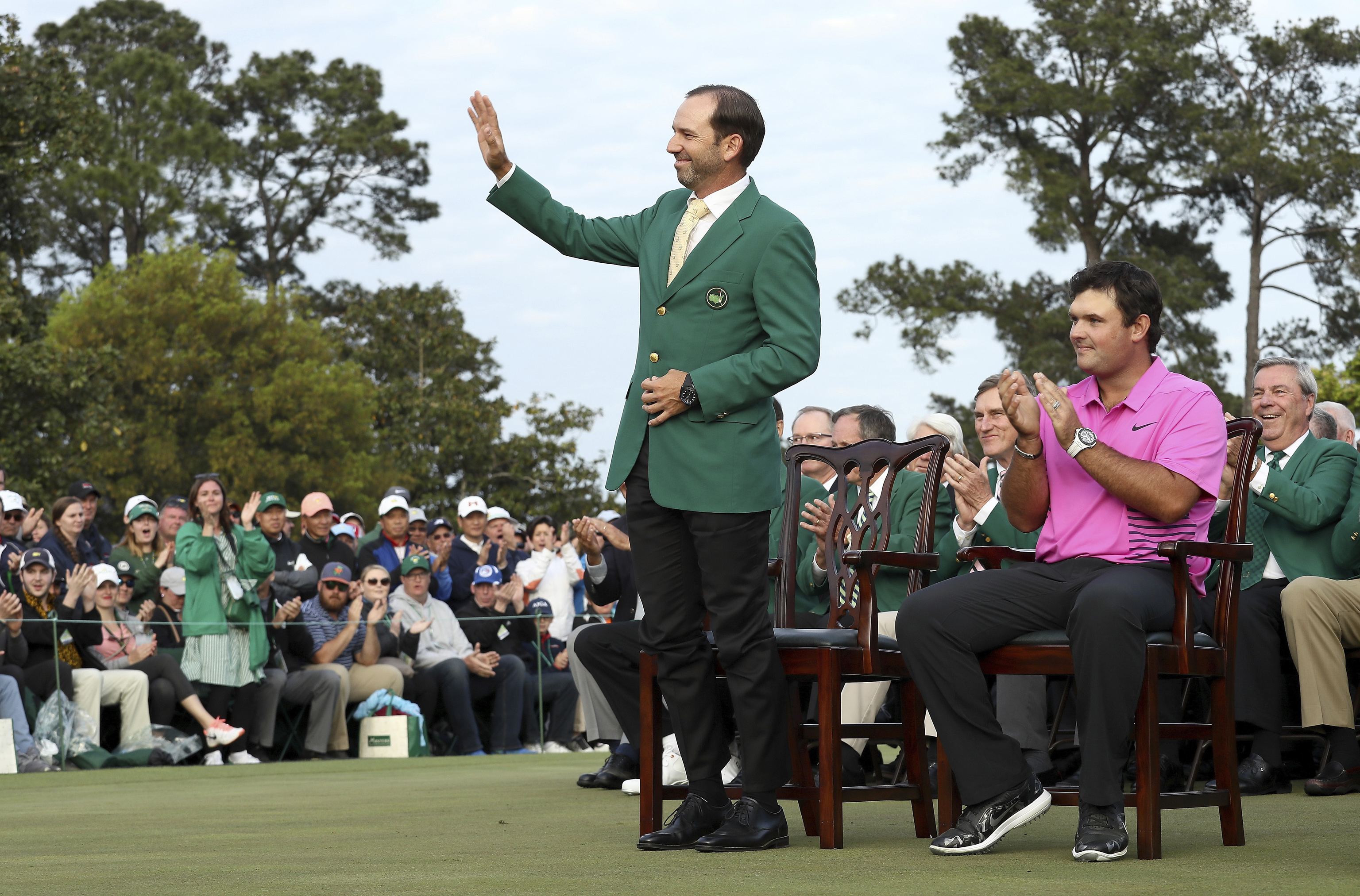 Sergio García, con la chaqueta verde, en el Masters de Augusta de 2018.