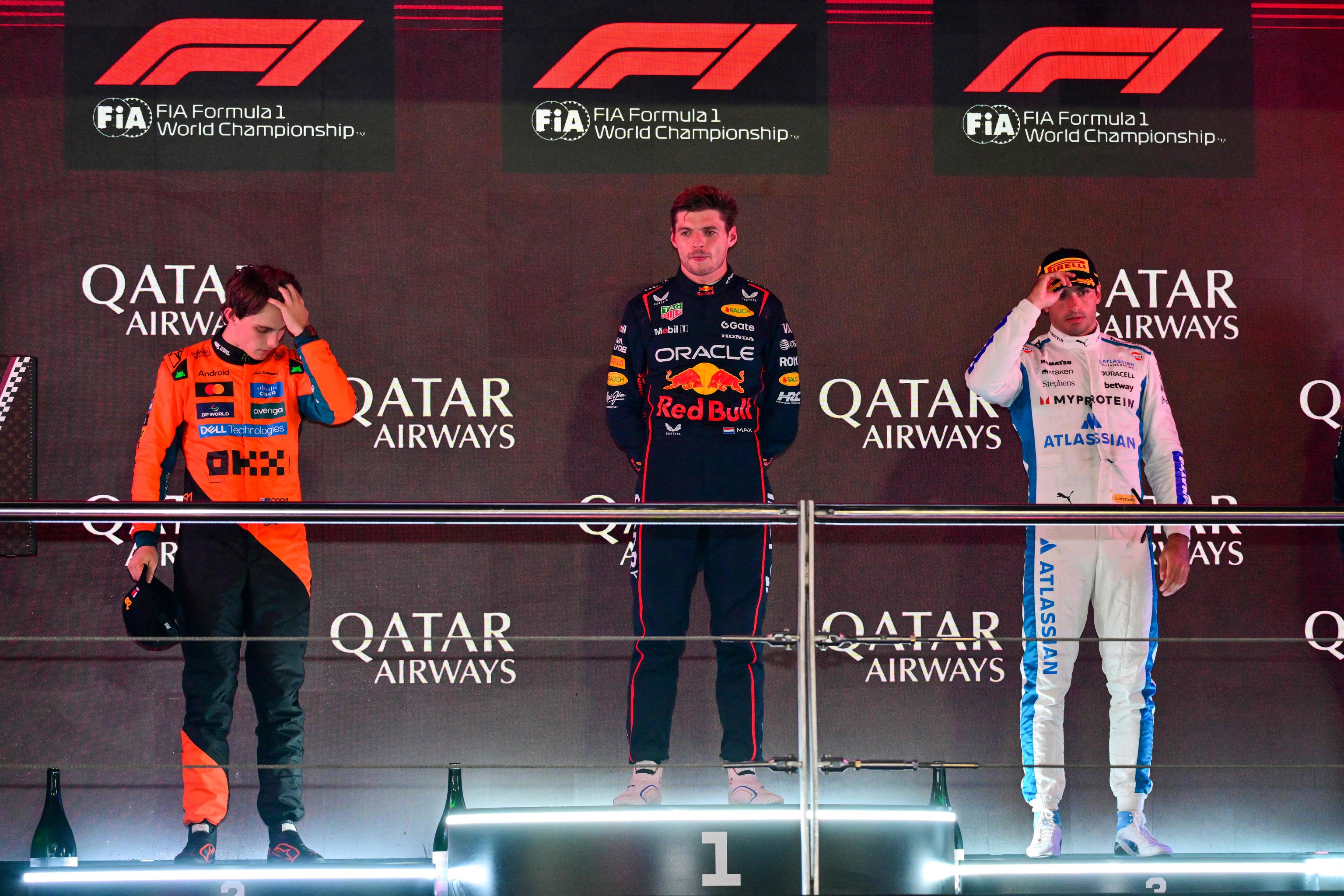 El podio de Qatar, con Verstappen, Oscar Piastri y Carlos Sainz.