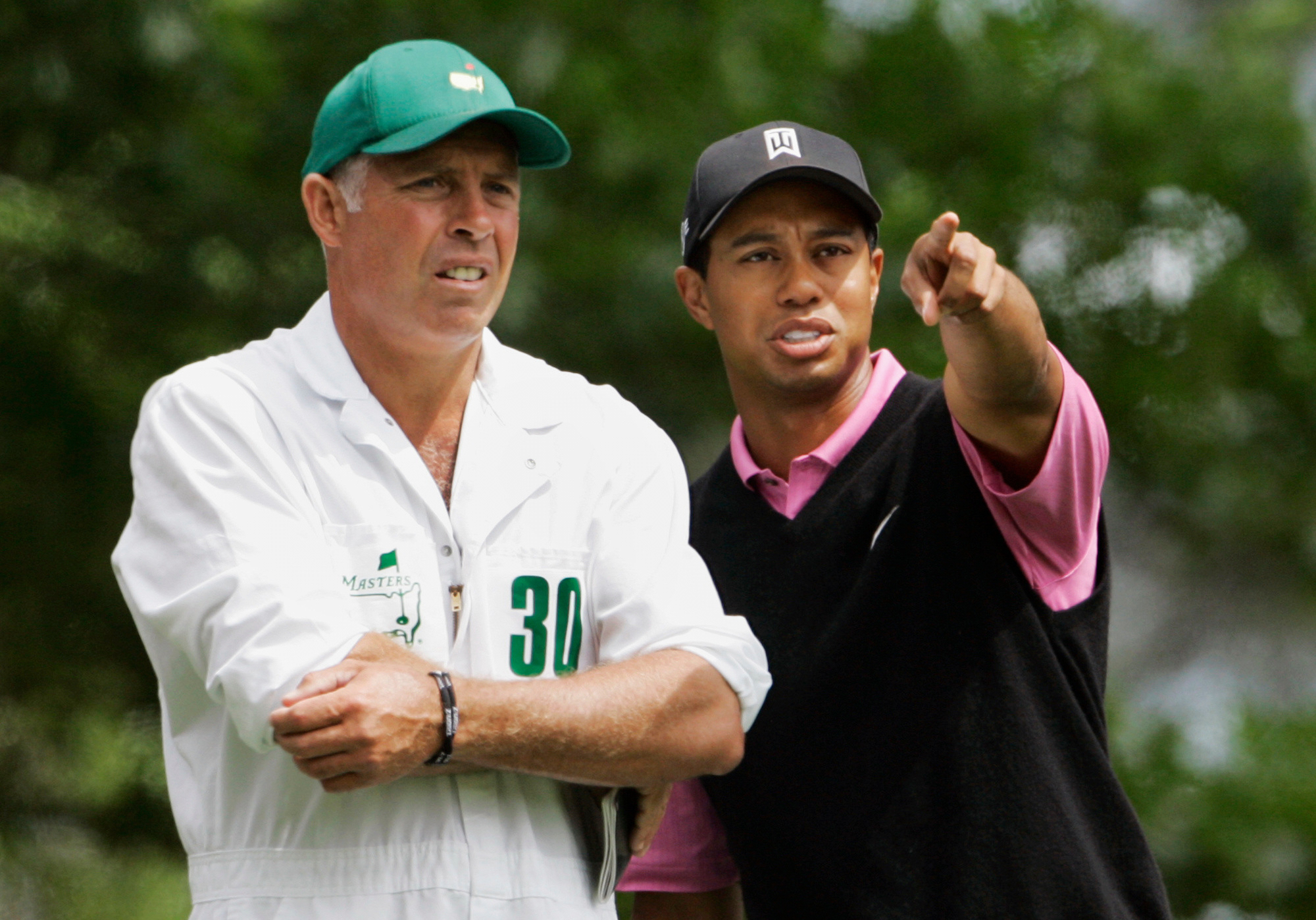Woods, con su 'caddie', Steve Williams, en el Masters 2007.